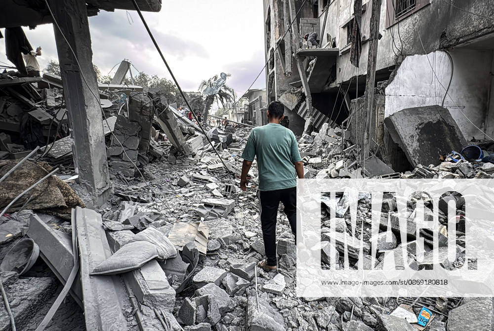 Palestinians Inspect Damage After Strike in Deir al-Balah Palestinians inspect their belongings amid the rubble of damaged residential buildings and their displacement tents after an Israeli airstrike targeted a house in Deir al-Balah, in the central Gaza Strip, on October 11, 2026. Photo by Ahmed Ibrahim apaimages Deir al-Balah Gaza Palestinian Territory 111026_Deir_al-Balah_AI_00(19)