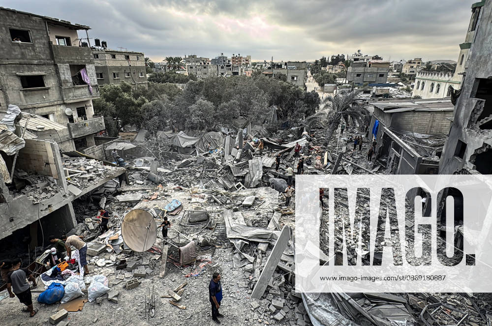 Palestinians Inspect Damage After Strike in Deir al-Balah Palestinians inspect their belongings amid the rubble of damaged residential buildings and their displacement tents after an Israeli airstrike targeted a house in Deir al-Balah, in the central Gaza Strip, on October 11, 2026. Photo by Ahmed Ibrahim apaimages Deir al-Balah Gaza Palestinian Territory 111026_Deir_al-Balah_AI_00(6)