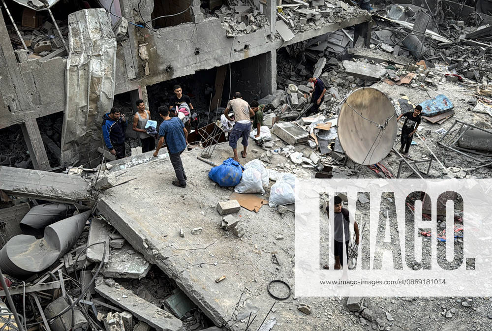 Palestinians Inspect Damage After Strike in Deir al-Balah Palestinians inspect their belongings amid the rubble of damaged residential buildings and their displacement tents after an Israeli airstrike targeted a house in Deir al-Balah, in the central Gaza Strip, on October 11, 2026. Photo by Ahmed Ibrahim apaimages Deir al-Balah Gaza Palestinian Territory 111026_Deir_al-Balah_AI_00(4)