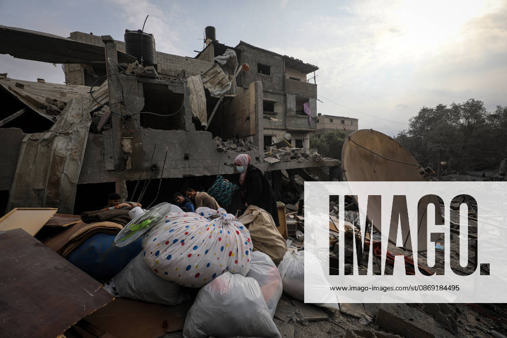 Palestinians Inspect Damage After Strike in Al-Zawayda Palestinians inspect their belongings amid the rubble of damaged residential buildings after an Israeli airstrike targeted a residential block in Al-Zawayda, in the central Gaza Strip, on October 11, 2026. Photo by Moiz Salhi apaimages Nusairat Gaza Strip Palestinian Territory 111026_Al-Zawayda_MS_00(40)