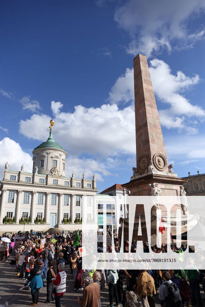 Protesters stand on the Alter Markt during a demonstration calling for the Federal Constitutional Court to review far-right parties, Potsdam, October 10, 2026 Protest in Potsdam