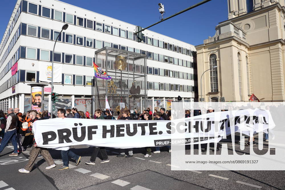 Protesters march with a banner reading Review today, Schütz tomorrow at the data center during a demonstration calling for the Federal Constitutional Court to review far-right parties, Potsdam, October 10, 2026. Review demonstration in Potsdam