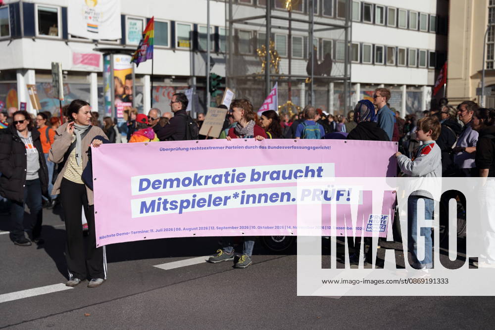 Protesters march with a banner reading Democracy Needs Participants during a demonstration calling for the Federal Constitutional Court to review far-right parties, Potsdam, October 10, 2026. Protest in Potsdam