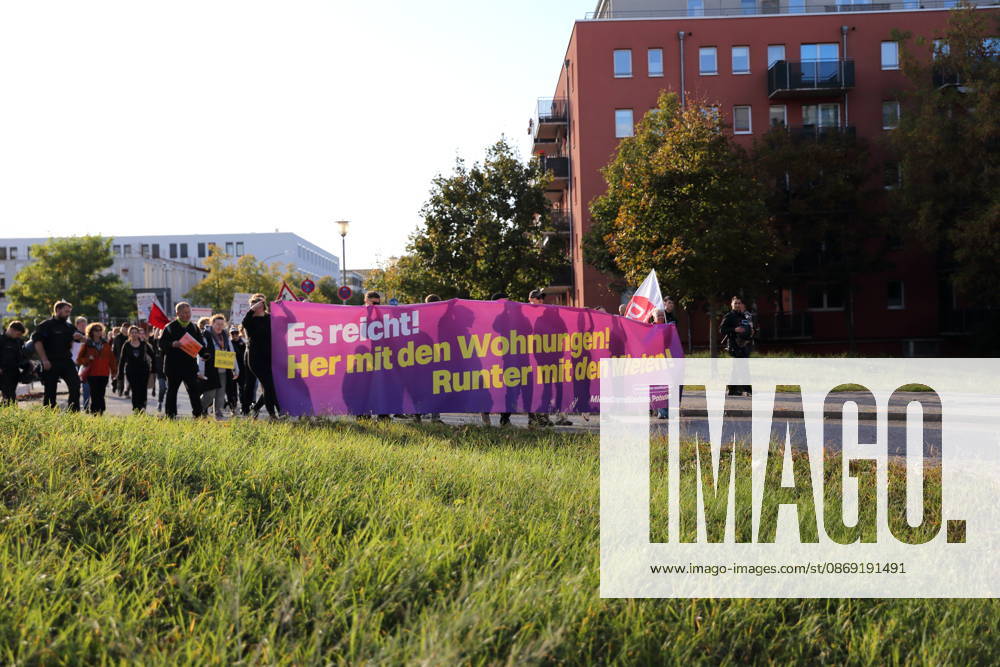 Protesters march along Humboldtring carrying a banner reading Enough is enough! Give us housing! Lower the rents! during a demonstration against the housing crisis and rising rents, Potsdam, October 10, 2026. Rent Protest in Potsdam