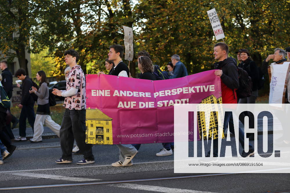 Protesters march with a banner reading A Different Perspective on the City: A City for Everyone on Rudolf Breitscheid Street during a demonstration against the housing crisis and rising rents, Potsdam, October 10, 2026. Rent Protest in Potsdam
