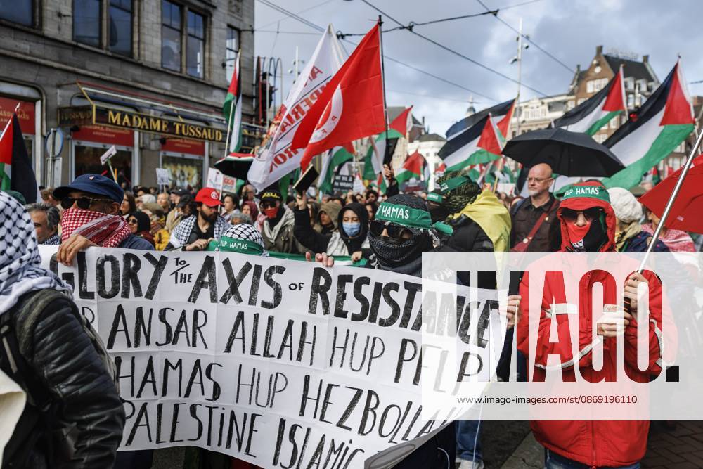 AMSTERDAM - Demonstrators during a national protest on Dam Square marking the conclusion of the nationwide week of action for sanctions against Israel. According to various activist groups, despite the ceasefire , the genocide against the Palestinian people continues unabated. KOEN VAN WEEL ANP netherlands out - belgium out