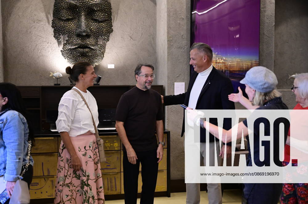 Jan Josef Liefers, Jens Christian Wittig, and Annett Weise at the opening of the exhibition *Goldener Reigen* by Jens Christian Wittig at Kastenmeiers in the Taschenbergpalais in Dresden, Dresden