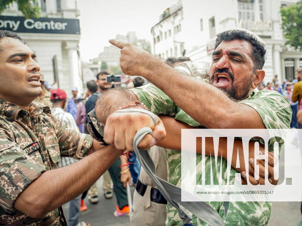 Protester being detained during their protest against CEC Gyanesh Kumar in New Delhi New Delhi, Oct 11 (ANI): A protester being detained during their protest against Chief Election Commissioner Gyanesh Kumar at Palika Bazar, Connaught Place, in New Delhi on Sunday. NEW DELHI Delhi India