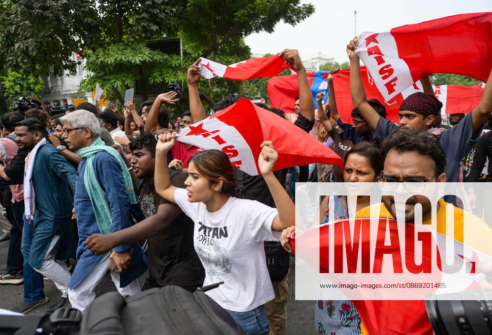 Protesters during a protest against CEC Gyanesh Kumar at Connaught Place in New Delhi New Delhi, Oct 11 (ANI): Protesters hold an All India Students Federation (AISF) flag during a protest against Chief Election Commissioner Gyanesh Kumar at Connaught Place, in New Delhi on Sunday. NEW DELHI Delhi India