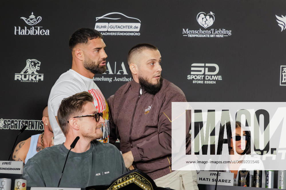 Aleks Petrovic and Eugen Lopez in a scuffle during the press conference for Fame Fighting 4 Celebrity Boxing at the Atlantic Hotel in Essen, North Rhine-Westphalia, Germany