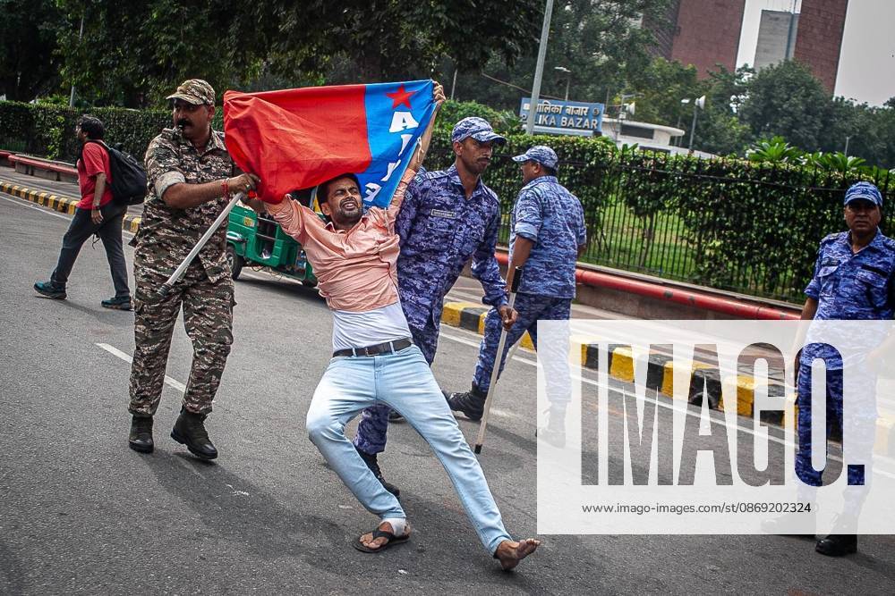 Protest to demand resignation of India s chief election commissioner in New Delhi NEW DELHI, INDIA - OCTOBER 11: Indian police officers detain a protestor during a mass protest organized by the Cockroach Janta Party (CJP) in New Delhi, India on October 11, 2026. Demonstrators gathered to demand the resignation of Chief Election Commissioner Gyanesh Kumar over alleged electoral roll irregularities and revisions. Yousuf Sarfaraz Anadolu New Delhi India. Editorial use only. Please get in touch for any other usage.