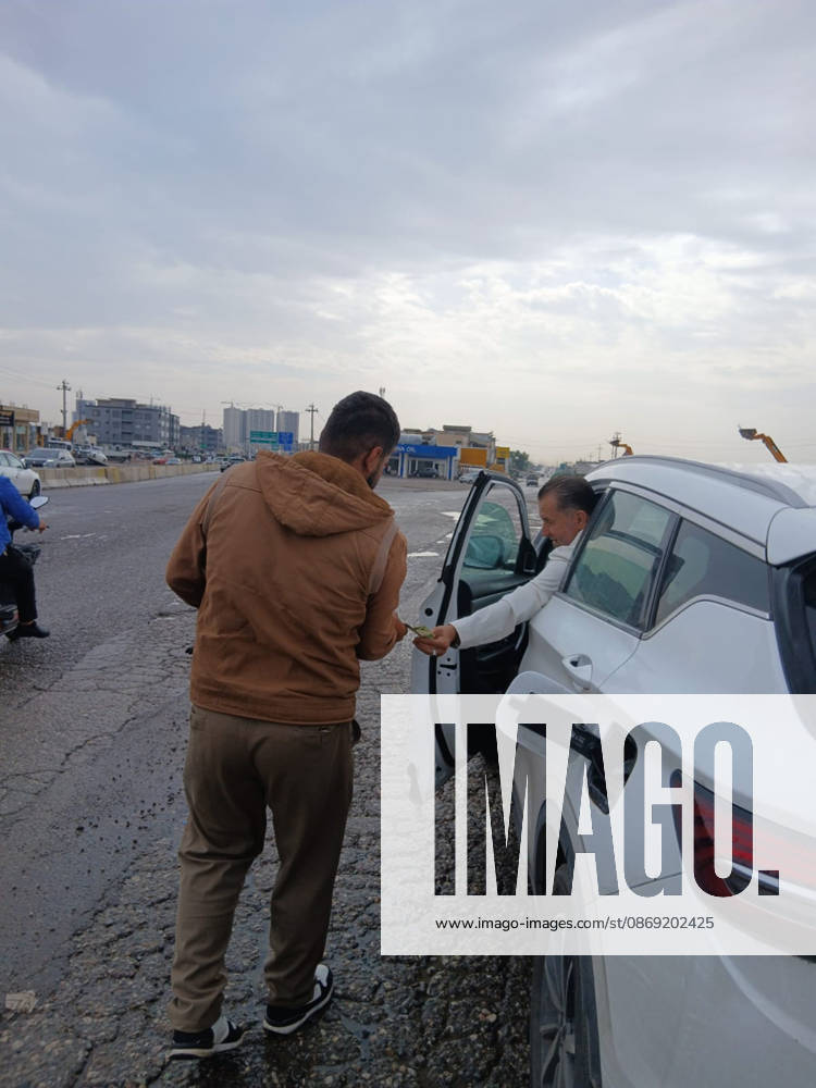 Motorists wait in long queues at a petrol station in Erbil, capital of the Kurdistan Region, on October 11, 2026. Drivers in the region are facing severe fuel shortages and rising prices, forcing many to wait for hours twice a week. Due to the scarcity and high costs at official stations, residents increasingly turn to roadside vendors selling fuel in plastic containers, which are slightly cheaper, amid growing economic pressures. Erbil Iraq - ZUMAr205 20261011_zip_r205_003