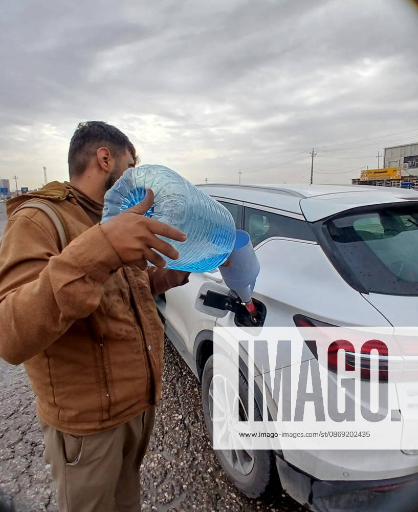 Motorists wait in long queues at a petrol station in Erbil, capital of the Kurdistan Region, on October 11, 2026. Drivers in the region are facing severe fuel shortages and rising prices, forcing many to wait for hours twice a week. Due to the scarcity and high costs at official stations, residents increasingly turn to roadside vendors selling fuel in plastic containers, which are slightly cheaper, amid growing economic pressures. Erbil Iraq - ZUMAr205 20261011_zip_r205_004