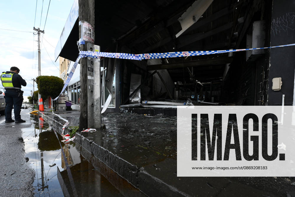 FITZROY NORTH TOBACCO SHOP FIRE, Victoria Police establish a crime scene after a fire at a tobacco shop fire in Fitzroy North, in Melbourne, Monday, October 12, 2026. ( NO ARCHIVING MELBOURNE VICTORIA Australia