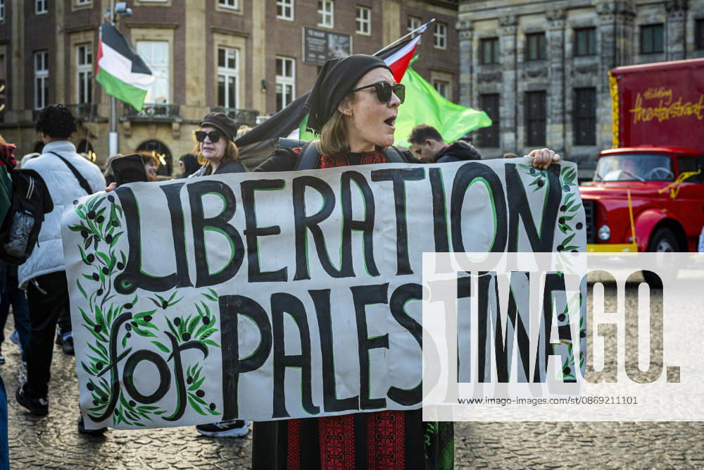 Amsterdam, North Holland, The Netherlands - Holland: 11 October 2026, Amsterdam, the Netherlands: Protesters gathered at Dam Square for speeches and anti-war music before marching through Amsterdamâ€⠢s city centre in a demonstration dubbed â€oeThree Years of Genocideâ€Â. The event marked three years since the start of the Israelâ€Hamas war. Demonstrators carried Palestinian flags and banners, demanding the Dutch government act against what they describe as a genocide in Gaza. Amsterdam The Netherlands - Holland - ZUMAp202 20261011_zip_p202_006