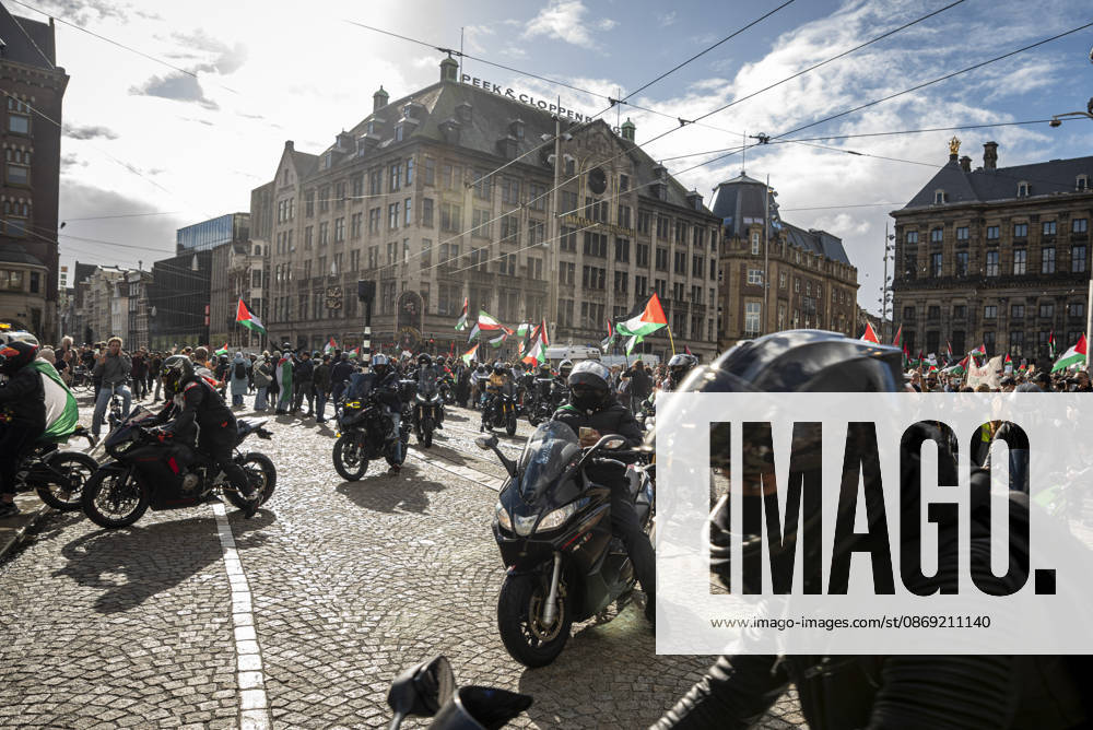 Amsterdam, North Holland, The Netherlands - Holland: 11 October 2026, Amsterdam, the Netherlands: The group Bikers for Palestine arrives to Dam Square. Protesters gathered at Dam Square for speeches and anti-war music before marching through Amsterdamâ€⠢s city centre in a demonstration dubbed â€oeThree Years of Genocideâ€Â. The event marked three years since the start of the Israelâ€Hamas war. Demonstrators carried Palestinian flags and banners, demanding the Dutch government act against what they describe as a genocide in Gaza. Amsterdam The Netherlands - Holland - ZUMAp202 20261011_zip_p202_012