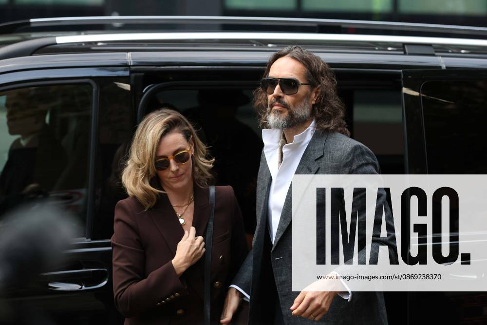 Russell Brand attends preliminary hearing on rape and sexual assault charges LONDON, UNITED KINGDOM - OCTOBER 12: Russell Brand (R), accompanied by his wife Laura Brand (L), arrives at Southwark Crown Court in London, United Kingdom, for a preliminary hearing over rape and sexual assault charges against him, on October 12, 2026. Zeynep Demir Anadolu London United Kingdom. Editorial use only. Please get in touch for any other usage.