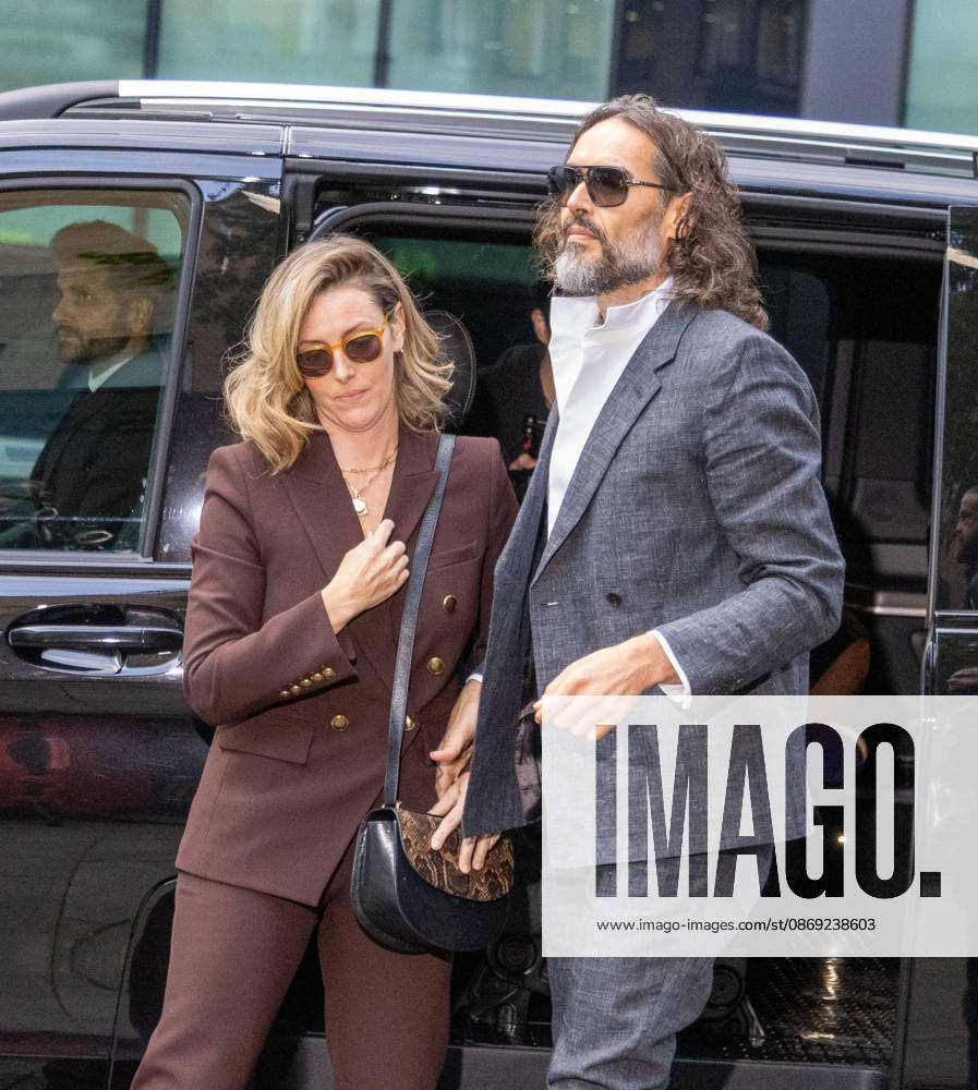 RUSSELL BRAND with his wife LAURA arrives at Southwark Crown Court, where he is facing three charges of rape, indecent assault, and three counts of sexual assault, relating to six women. London United Kingdom - ZUMAs262 20261012_zip_s262_001