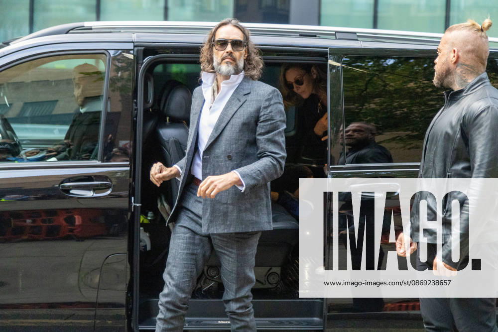 RUSSELL BRAND arrives at Southwark Crown Court, where he is facing three charges of rape, indecent assault, and three counts of sexual assault, relating to six women. London United Kingdom - ZUMAs262 20261012_zip_s262_006