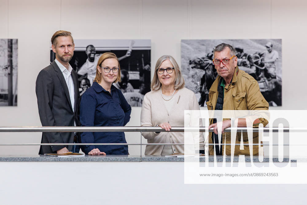 VHS Director Lorenz Denks, Eva Rottstedt, Director of the Municipal Gallery; former Deputy Mayor Dr. Christiane Zangs; and photographer Andreas Woitschützke (WOI) at the press conference for the photo exhibition side by side by Andreas Woitschützke at Neuss RomaNEum, VHS North Rhine-Westphalia, Germany