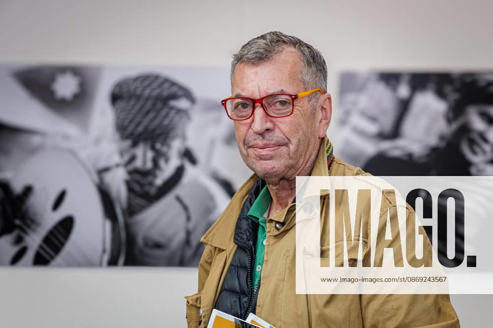 Photographer Andreas Woitschützke (WOI) at the press conference for the photo exhibition side by side by Andreas Woitschützke at RomaNEum, VHS North Rhine-Westphalia, Germany