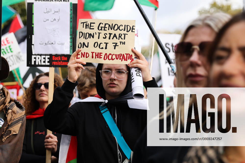 National March for Palestine, London. UK - 12 Oct 2026 A pro-Palestine supporter holds a placard as thousands of pro-Palestine supporters take part in the National March for Palestine in central London, carrying placards and Palestinian flags and calling for Palestinian rights and an end to the conflict in Gaza, three days after the third anniversary of the 7 October attacks on Israel. The march took place amid ongoing protests over the conflict in Gaza, with demonstrators calling for Palestinian rights and an end to the war. London United Kingdom