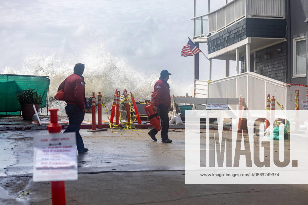 Waves crash into the boardwalk along the Belmont Shore peninsula while Long Beach City Lifeguards watch as remnants of Tropical Storm Rachel make their way through Southern California. Long Beach USA - ZUMAc316 20261011_znp_c316_004