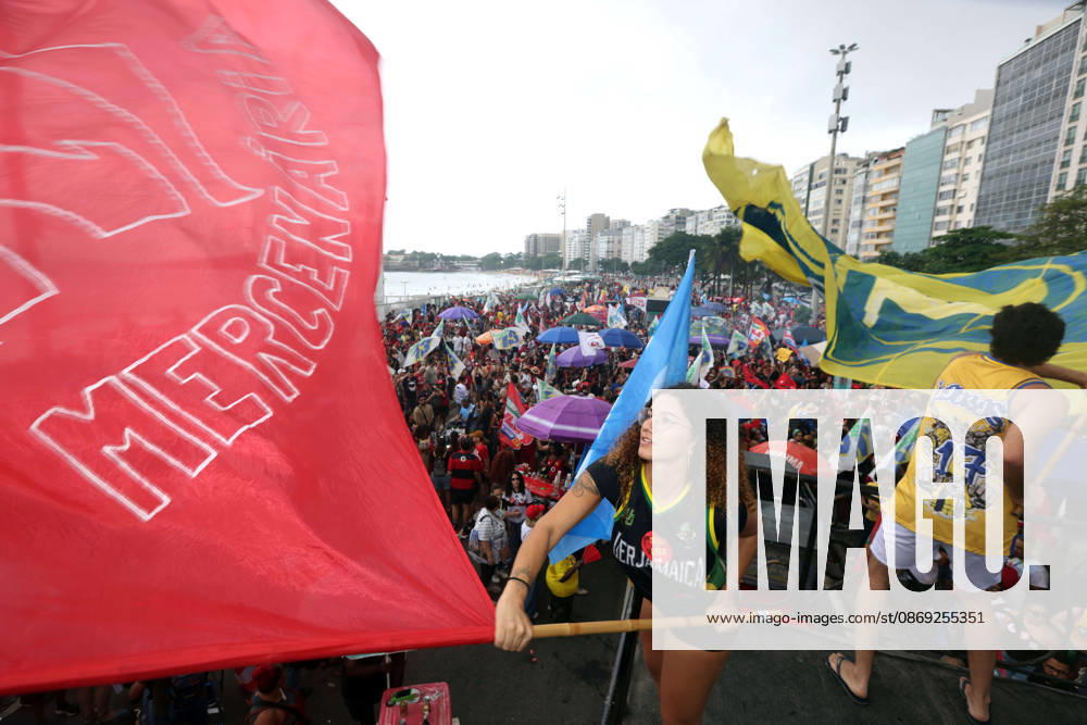 Thousands of supporters gather in Copacabana, Rio de Janeiro, Brazil, on October 12, 2026, for a pro-democracy demonstration organized by the CENA Nacional movement, the National Union of Students (UNE) and Universibloco. Held on BrazilÃ¢â‚¬â ¢s Our Lady of Aparecida national holiday, the rally calls for the defense of constitutional rights and public policies supporting healthcare, education and social assistance. Carnival street bands, known as blocos, and percussion groups brought music and a festive atmosphere to the waterfront mobilization, blending political activism with RioÃ¢â‚¬â ¢s popular street culture. The demonstration takes place ahead of BrazilÃ¢â‚¬â ¢s October 25 pres - ZUMAk251 20261012_znp_k251_006