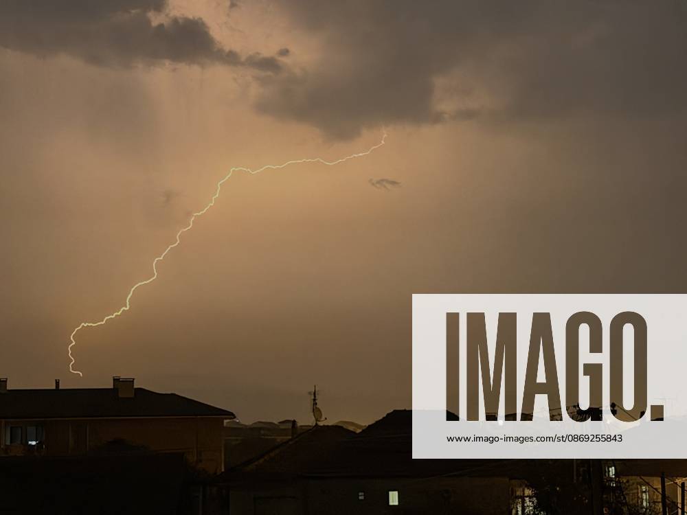 Lightning illuminates night sky during heavy rain in Duzce DUZCE, TURKIYE - OCTOBER 12: Lightning streaks across the sky over Duzce as heavy rain affects the city during the evening hours, on October 12, 2026 in Duzce, Turkiye. Omer Urer Anadolu Duzce Turkey. Editorial use only. Please get in touch for any other usage.