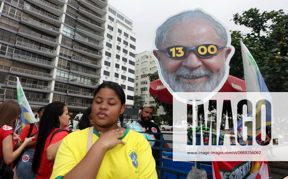 Thousands of supporters gather in Copacabana, Rio de Janeiro, Brazil, on October 12, 2026, for a pro-democracy demonstration organized by the CENA Nacional movement, the National Union of Students (UNE) and Universibloco. Held on BrazilÃ¢â‚¬â ¢s Our Lady of Aparecida national holiday, the rally calls for the defense of constitutional rights and public policies supporting healthcare, education and social assistance. Carnival street bands, known as blocos, and percussion groups brought music and a festive atmosphere to the waterfront mobilization, blending political activism with RioÃ¢â‚¬â ¢s popular street culture. The demonstration takes place ahead of BrazilÃ¢â‚¬â ¢s October 25 pres - ZUMAk251 20261012_znp_k251_018