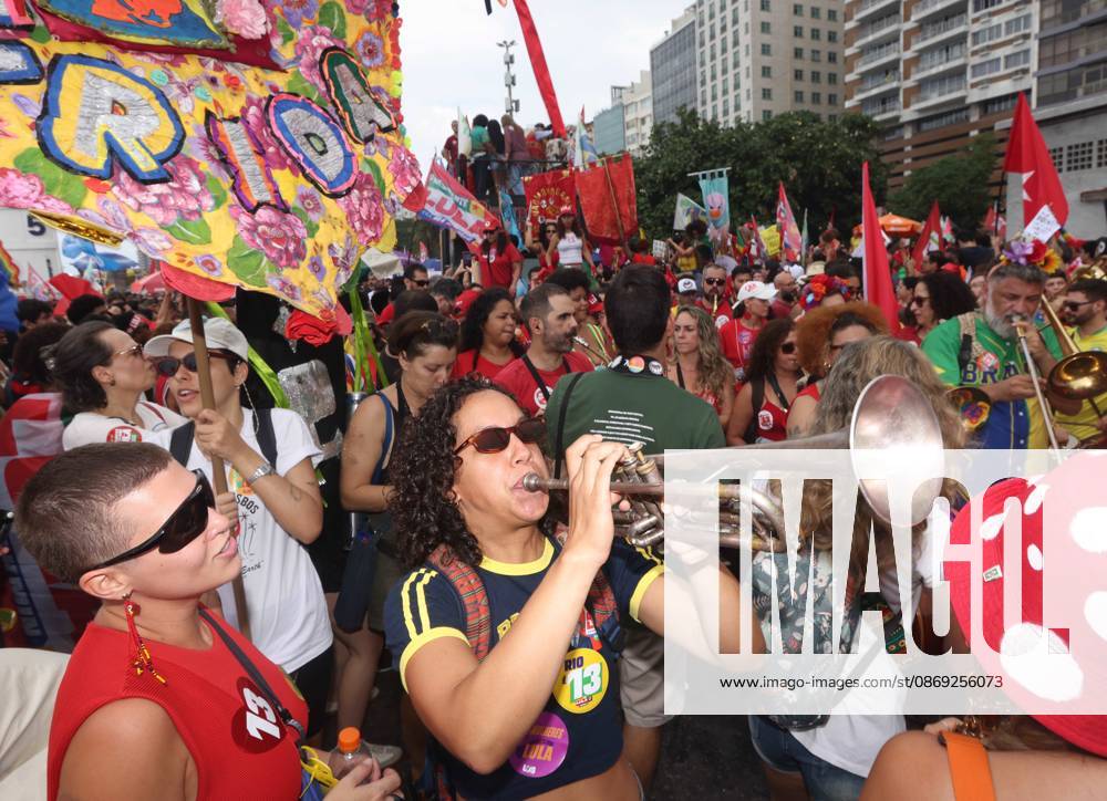 Thousands of supporters gather in Copacabana, Rio de Janeiro, Brazil, on October 12, 2026, for a pro-democracy demonstration organized by the CENA Nacional movement, the National Union of Students (UNE) and Universibloco. Held on BrazilÃ¢â‚¬â ¢s Our Lady of Aparecida national holiday, the rally calls for the defense of constitutional rights and public policies supporting healthcare, education and social assistance. Carnival street bands, known as blocos, and percussion groups brought music and a festive atmosphere to the waterfront mobilization, blending political activism with RioÃ¢â‚¬â ¢s popular street culture. The demonstration takes place ahead of BrazilÃ¢â‚¬â ¢s October 25 pres - ZUMAk251 20261012_znp_k251_021