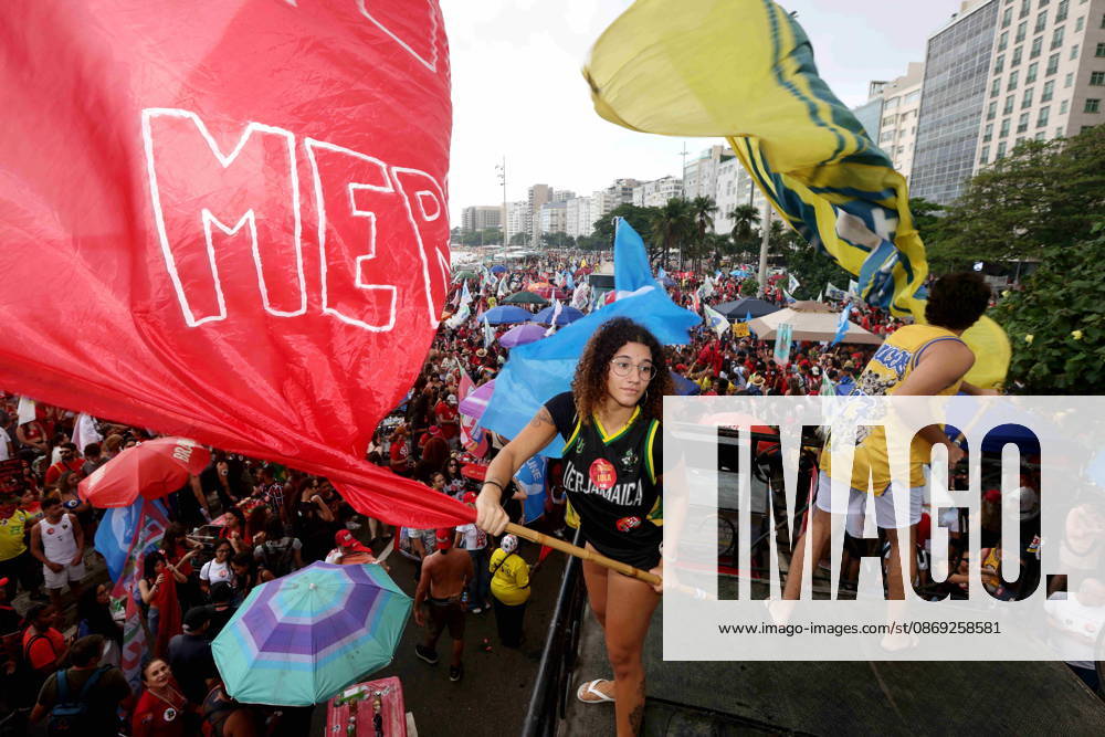 Thousands of supporters gather in Copacabana, Rio de Janeiro, Brazil, on October 12, 2026, for a pro-democracy demonstration organized by the CENA Nacional movement, the National Union of Students (UNE) and Universibloco. Held on BrazilÃ¢â‚¬â ¢s Our Lady of Aparecida national holiday, the rally calls for the defense of constitutional rights and public policies supporting healthcare, education and social assistance. Carnival street bands, known as blocos, and percussion groups brought music and a festive atmosphere to the waterfront mobilization, blending political activism with RioÃ¢â‚¬â ¢s popular street culture. The demonstration takes place ahead of BrazilÃ¢â‚¬â ¢s October 25 pres - ZUMAport 20261012_znp_k251_010