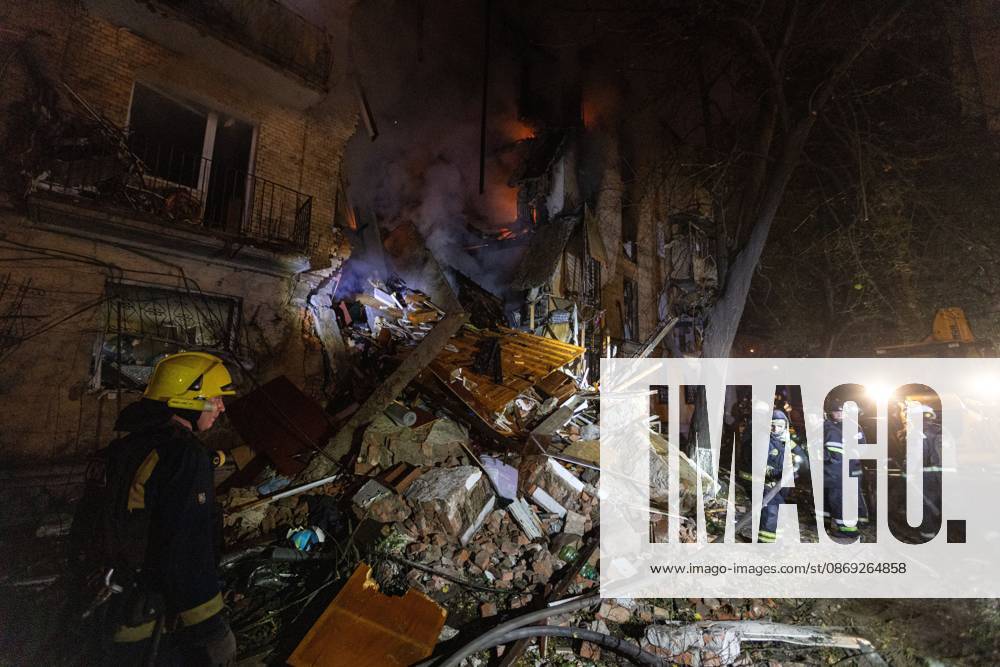 Rescue Operations After Kharkiv Strike KHARKIV, UKRAINE, OCTOBER 12, 2026: Emergency workers conduct rescue operations at a residential building damaged in a Russian strike in Kharkiv s Kholodnohirskyi district. A firefighter was injured by falling concrete debris while clearing the rubble and was evacuated on a stretcher. Kharkiv Ukraine