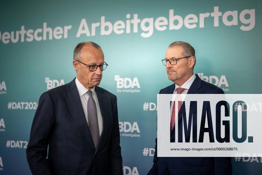 Chancellor Friedrich Merz is welcomed by Rainer Dulger, President of the Confederation of German Employers Associations (BDA), at the start of the 2026 German Employers Day, hosted by the Confederation of German Employers Associations (BDA), Berlin, Germany, at the Berlin Congress Center (bcc)