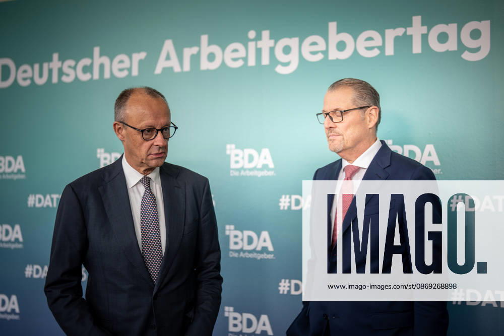 Chancellor Friedrich Merz is welcomed by Rainer Dulger, President of the Confederation of German Employers Associations (BDA), at the start of the 2026 German Employers Day, hosted by the Confederation of German Employers Associations (BDA), Berlin, Germany, at the Berlin Congress Center (bcc)