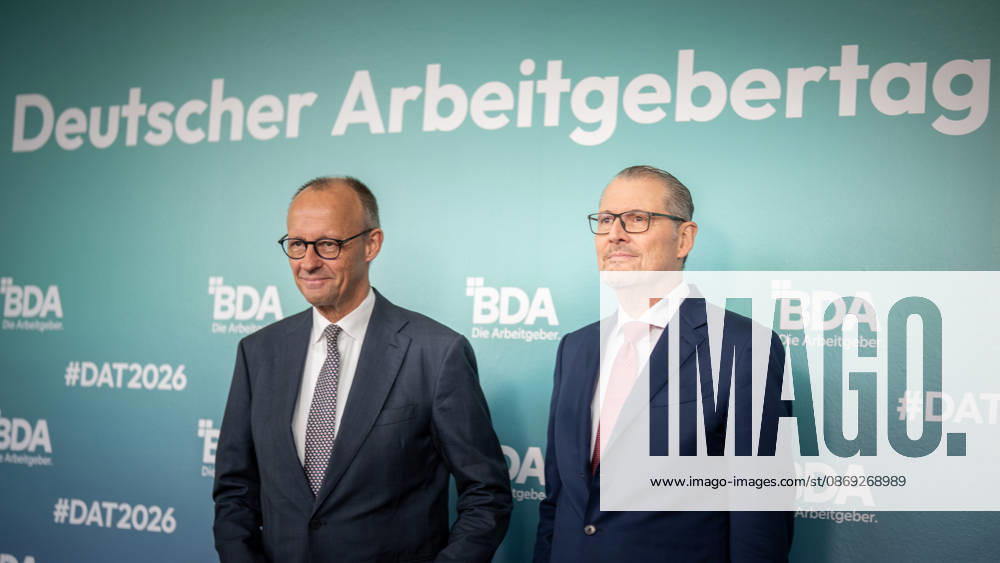 Chancellor Friedrich Merz is welcomed by Rainer Dulger, President of the Confederation of German Employers Associations (BDA), at the start of the 2026 German Employers Day, hosted by the Confederation of German Employers Associations (BDA), Berlin, Germany, at the Berlin Congress Center (bcc)