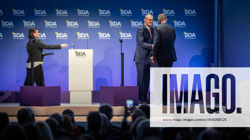 Chancellor Friedrich Merz is welcomed by Rainer Dulger, President of the Confederation of German Employers Associations (BDA), at the start of the 2026 German Employers Day, hosted by the Confederation of German Employers Associations (BDA), Berlin, Germany, at the Berlin Congress Center (bcc)