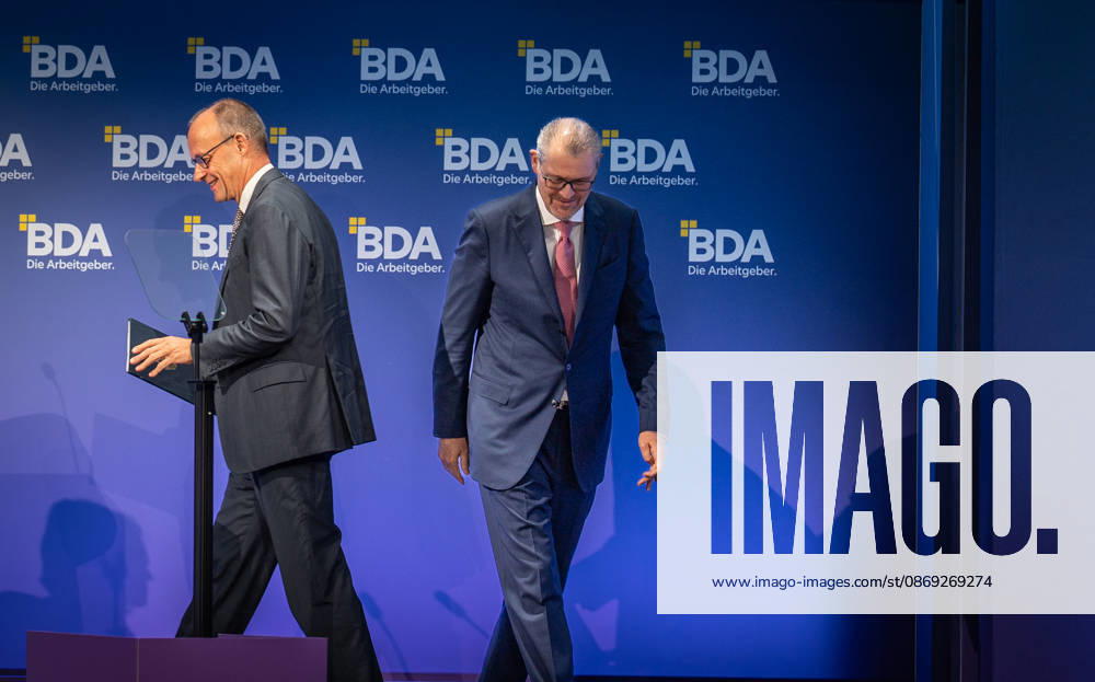 Chancellor Friedrich Merz is welcomed by Rainer Dulger, President of the Confederation of German Employers Associations (BDA), at the start of the 2026 German Employers Day, hosted by the Confederation of German Employers Associations (BDA), Berlin, Germany, at the Berlin Congress Center (bcc)