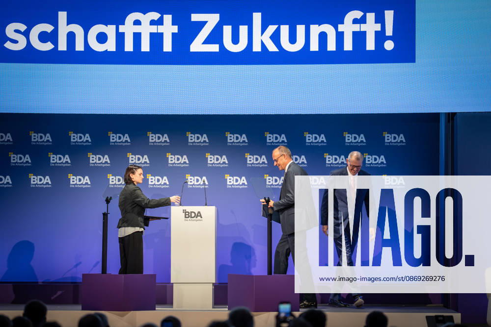 Chancellor Friedrich Merz is welcomed by Rainer Dulger, President of the Confederation of German Employers Associations (BDA), at the start of the 2026 German Employers Day, hosted by the Confederation of German Employers Associations (BDA), Berlin, Germany, at the Berlin Congress Center (bcc)