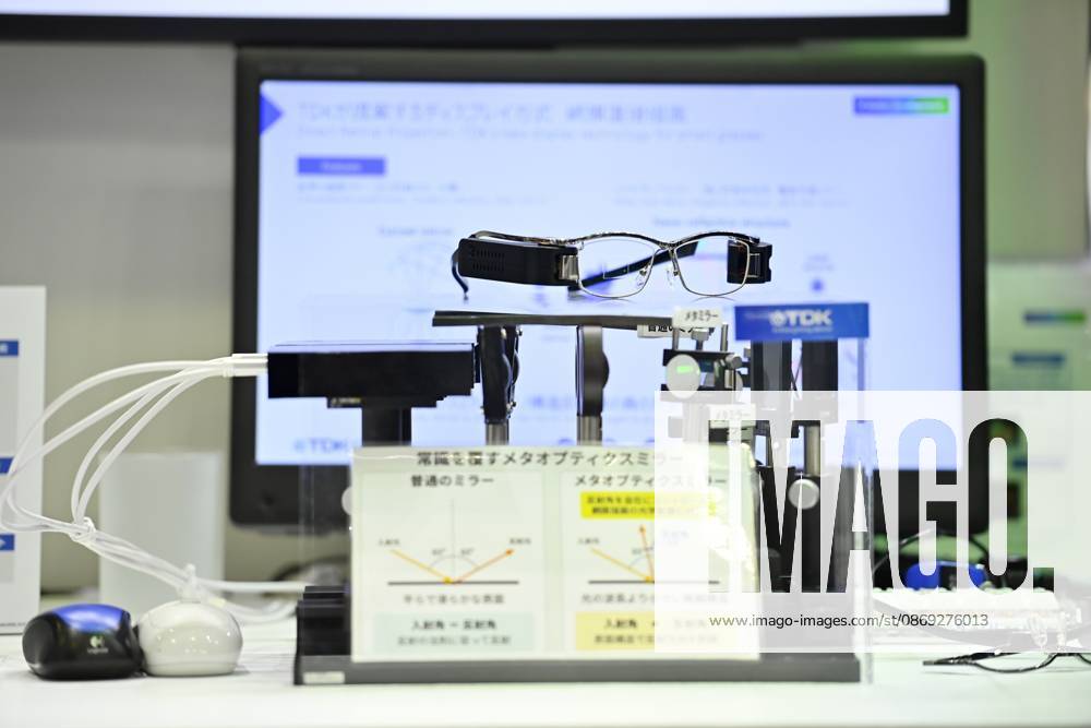 Japan showcases emerging technologies at CEATEC 2026 CHIBA, JAPAN - OCTOBER 13: A prototype of smart glasses incorporating TDK s Meta-Optic Mirror technology is displayed during CEATEC 2026 at Makuhari Messe in Chiba, Japan, October 13, 2026. The 150-nanometer-thick optical mirror is designed to replace bulkier curved mirrors traditionally used in direct retinal projection systems. David Mareuil Anadolu Chiba Japan. Editorial use only. Please get in touch for any other usage.