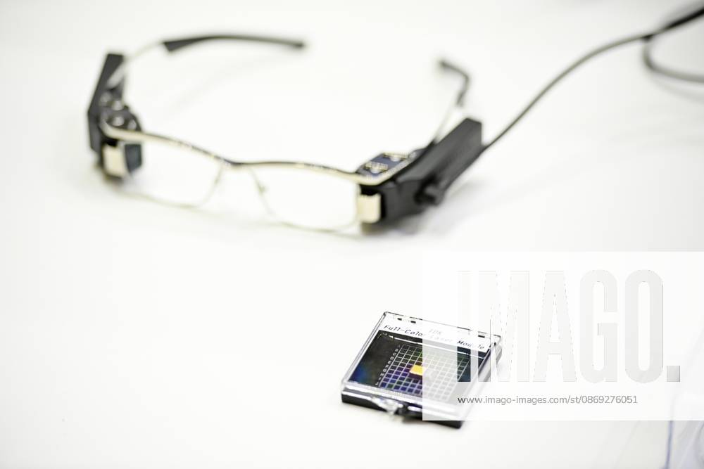 Japan showcases emerging technologies at CEATEC 2026 CHIBA, JAPAN - OCTOBER 13: A prototype of smart glasses incorporating TDK s Meta-Optic Mirror technology is displayed during CEATEC 2026 at Makuhari Messe in Chiba, Japan, October 13, 2026. The 150-nanometer-thick optical mirror is designed to replace bulkier curved mirrors traditionally used in direct retinal projection systems. David Mareuil Anadolu Chiba Japan. Editorial use only. Please get in touch for any other usage.