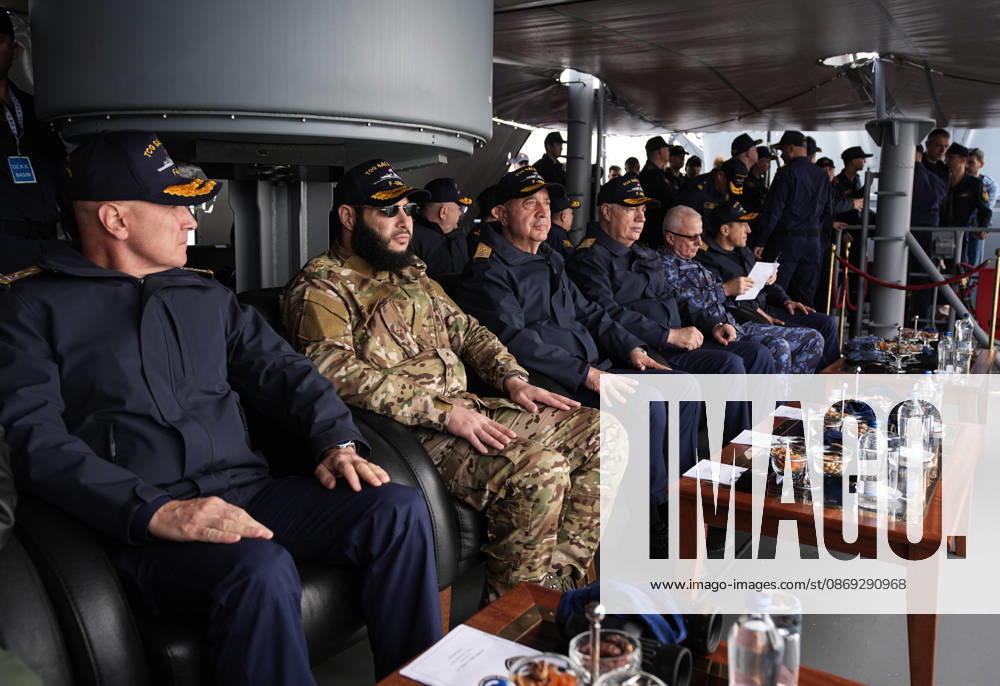NUSRET-2026 Invitational Exercise continues in Turkiye s Izmir IZMIR, TURKIYE - OCTOBER 13: Turkish Naval Forces Commander Admiral Ercument Tatlioglu (3rd L), Syrian Naval Forces Commander Brigadier General Mohammed al-Saud (2nd L) and other participants observe activities aboard TCG Salihreis, the flagship of the NUSRET-2026 Invitation Exercise, during Distinguished Observer Day activities off the coast of Foca, Izmir, Turkiye, on October 13, 2026. Hosted by Turkiye and conducted by the Turkish Naval Forces Mine Fleet Command, the exercise involves naval and air assets from NATO and Turkiye, as well as the Turkish Coast Guard, with observers from various countries. Mahmut Serdar Alakus Anadolu Izmir Turkey. Editorial use only. Please ge