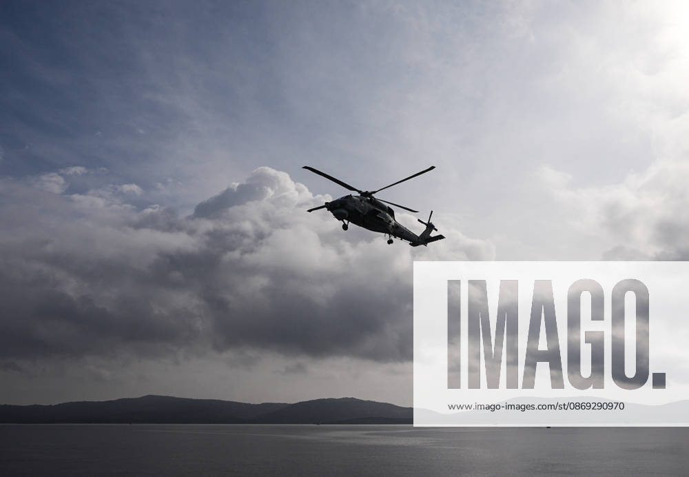 NUSRET-2026 Invitational Exercise continues in Turkiye s Izmir IZMIR, TURKIYE - OCTOBER 13: A military helicopter flies during Distinguished Observer Day activities held off the coast of Foca district in Izmir, Turkiye, on October 13, 2026, as part of the NUSRET-2026 Invitational Exercise. Hosted by Turkiye and conducted by the Turkish Naval Forces Mine Fleet Command, the exercise continues in the Gulf of Izmir and off Karadeniz Eregli, with the participation of naval, air and coast guard assets from NATO and Turkiye, along with observers from various countries. Mahmut Serdar Alakus Anadolu Izmir Turkey. Editorial use only. Please get in touch for any other usage.