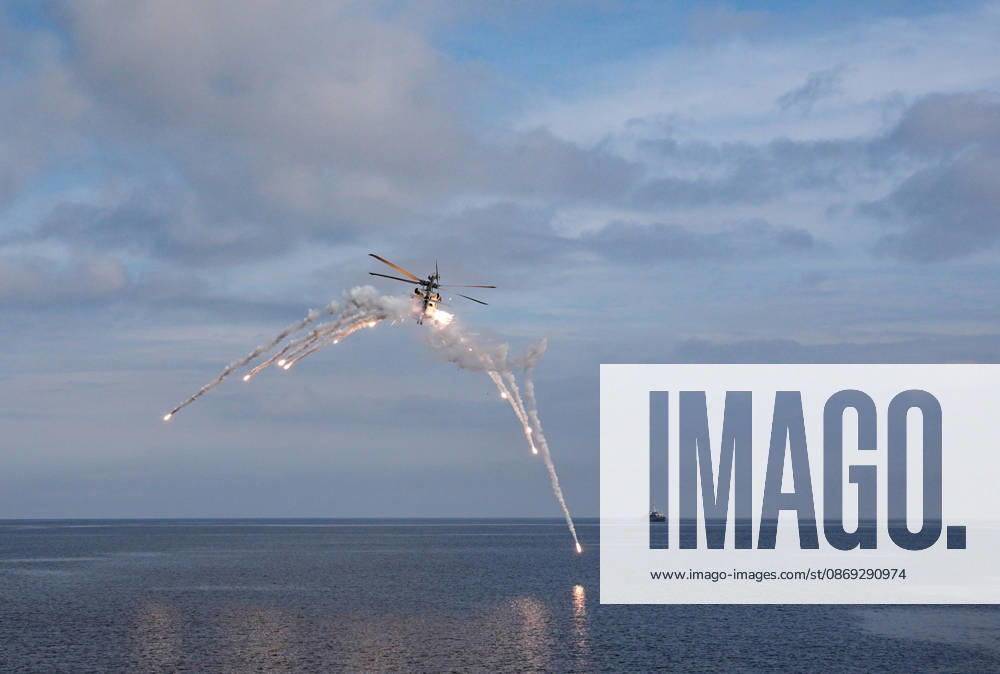 NUSRET-2026 Invitational Exercise continues in Turkiye s Izmir IZMIR, TURKIYE - OCTOBER 13: A military helicopter releases flares while flying during Distinguished Observer Day activities held off the coast of Foca district in Izmir, Turkiye, on October 13, 2026, as part of the NUSRET-2026 Invitation Exercise. Hosted by Turkiye and conducted by the Turkish Naval Forces Mine Fleet Command, the exercise continues in the Gulf of Izmir and off Karadeniz Eregli, with the participation of naval, air and coast guard assets from NATO and Turkiye, along with observers from various countries. Mahmut Serdar Alakus Anadolu Izmir Turkey. Editorial use only. Please get in touch for any other usage.