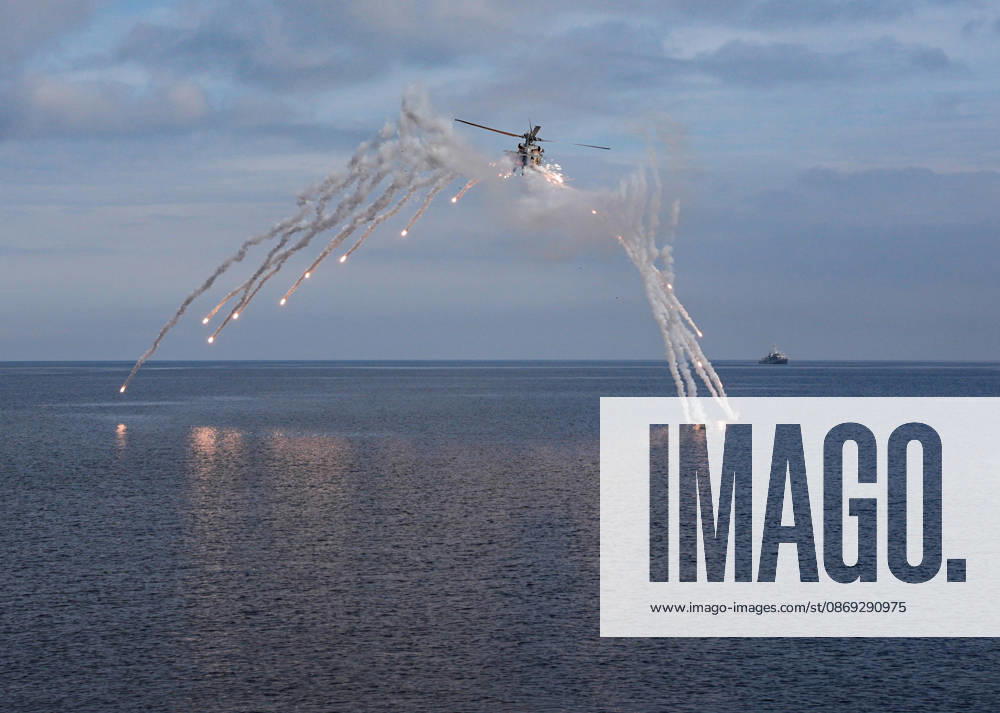 NUSRET-2026 Invitational Exercise continues in Turkiye s Izmir IZMIR, TURKIYE - OCTOBER 13: A military helicopter releases flares while flying during Distinguished Observer Day activities held off the coast of Foca district in Izmir, Turkiye, on October 13, 2026, as part of the NUSRET-2026 Invitation Exercise. Hosted by Turkiye and conducted by the Turkish Naval Forces Mine Fleet Command, the exercise continues in the Gulf of Izmir and off Karadeniz Eregli, with the participation of naval, air and coast guard assets from NATO and Turkiye, along with observers from various countries. Mahmut Serdar Alakus Anadolu Izmir Turkey. Editorial use only. Please get in touch for any other usage.