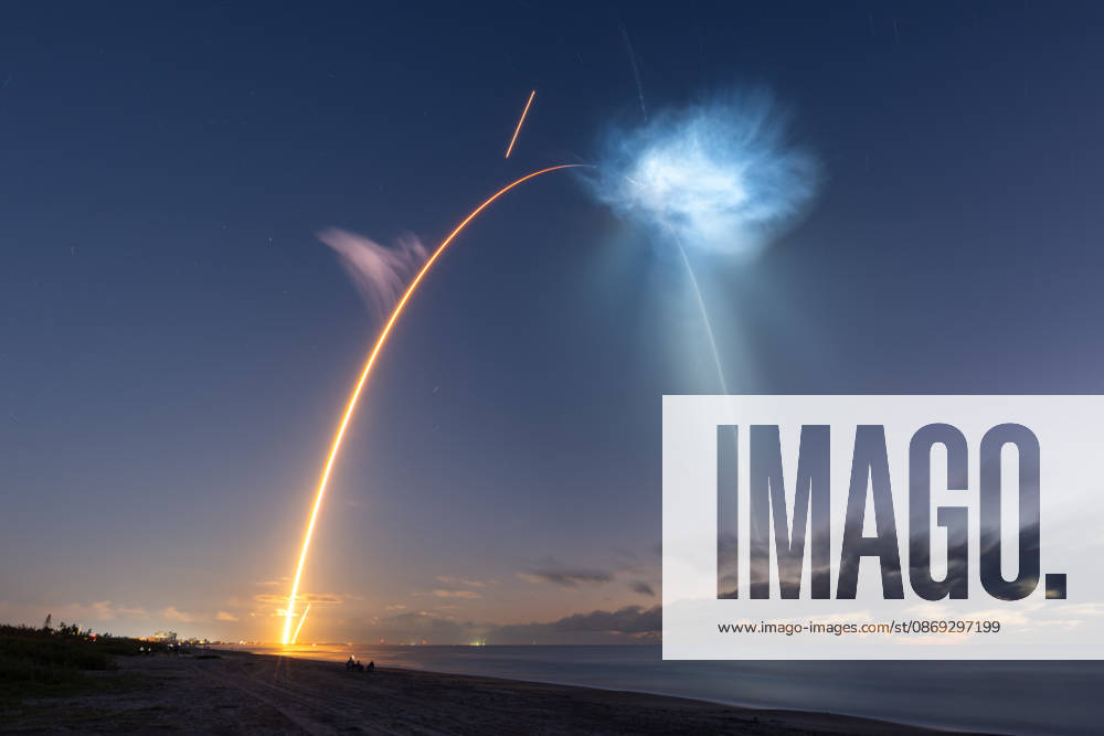 In this 480-second long-exposure photograph, a SpaceX Falcon 9 rocket carrying the company’s Dragon spacecraft launches on NASA’s SpaceX CRS-35 mission to the International Space Station, and its first stage returns to land at Landing Zone 40, Tuesday, Oct. 13, 2026, as seen from Cocoa Beach, Florida. The mission lifted off at 6:33 a.m. EDT from Space Launch Complex 40 at Cape Canaveral Space Force Station, carrying scientific experiments, supplies, and equipment to the orbital outpost on SpaceX’s 35th commercial resupply mission for NASA. The rocket’s exhaust plumes, illuminated by sunlight against the predawn sky, were visible across the eastern United States. John Kraus, NASA via Bestimage, Cocoa Beach