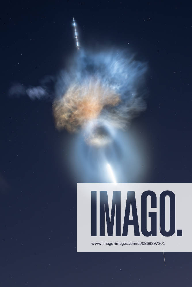 In this 15-second long-exposure photograph, the International Space Station appears as a streak of light during the launch of NASA’s SpaceX CRS-35 mission, as the Falcon 9 rocket’s first stage begins its return to Landing Zone 40 for landing and the rocket’s second stage and Dragon spacecraft continue toward orbit, Tuesday, Oct. 13, 2026, as seen from Cocoa Beach, Florida. The mission lifted off at 6:33 a.m. EDT from Space Launch Complex 40 at Cape Canaveral Space Force Station, carrying scientific experiments, supplies, and equipment to the orbital outpost on SpaceX’s 35th commercial resupply mission for NASA. The rocket’s exhaust plumes, illuminated by sunlight against the predawn sky, were visible across the eastern United States. John