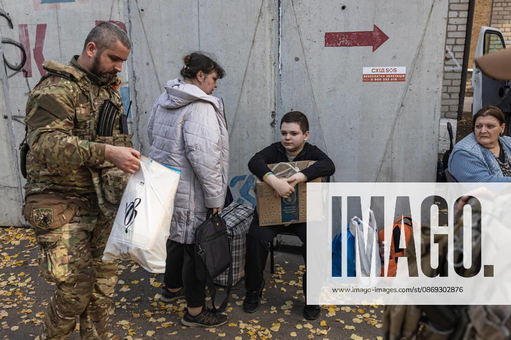 Police unit White Angels facilitates safe evacuation for family in war-torn Ukraine KRAMATORSK, UKRAINE - OCTOBER 13: A woman and her youngest son at an evacuation centre after being evacuated by the ‘White Angels’ police unit in the city of Kramatorsk, Ukraine, on October 13, 2026. Diego Herrera Carcedo Anadolu Kramatorsk Ukraine. Editorial use only. Please get in touch for any other usage.