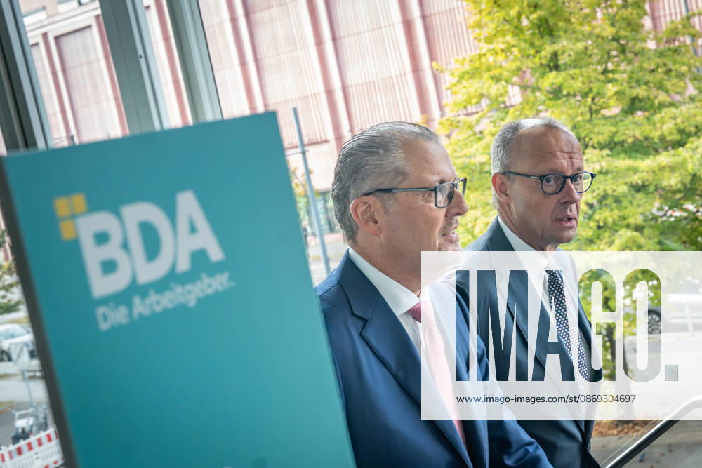 Chancellor Friedrich Merz is welcomed by Rainer Dulger, President of the Confederation of German Employers Associations (BDA), at the start of the 2026 German Employers Day, hosted by the Confederation of German Employers Associations (BDA), Berlin, Germany, at the Berlin Congress Center (bcc)