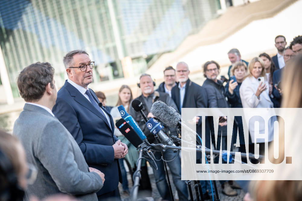 Lars Klingbeil, SPD Party Chairman and Federal Minister of Finance, and Alexander Schweitzer, Federal Minister of Labor-designate, at Friedrich-Ebert-Platz in front of the Bundestag building; introduction of the new Federal Minister of Labor on the day of his swearing-in by the SPD Party Chairman, Berlin, Germany, Friedrich-Ebert-Platz